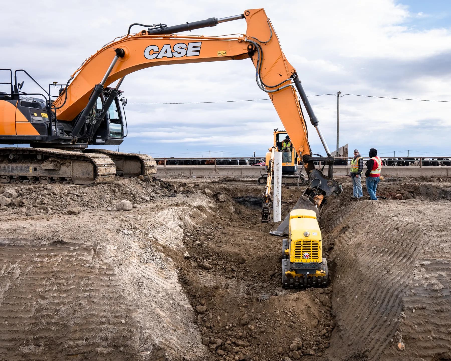Subterrain crew coordinating excavation work on site
